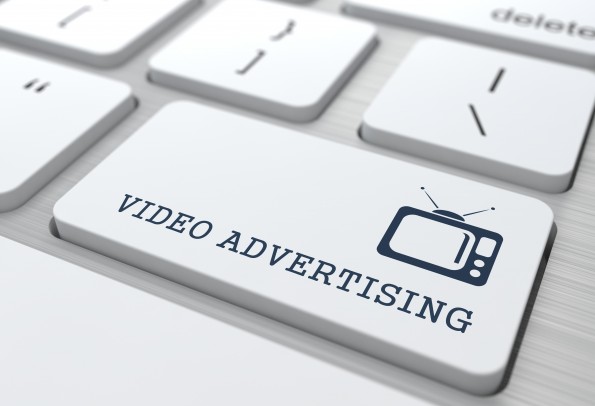 Video Advertising on White Keyboard Button.
